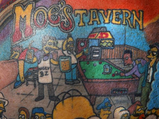 Illustration for article titled An Australian dude has 203 Simpsons characters tattooed on his back